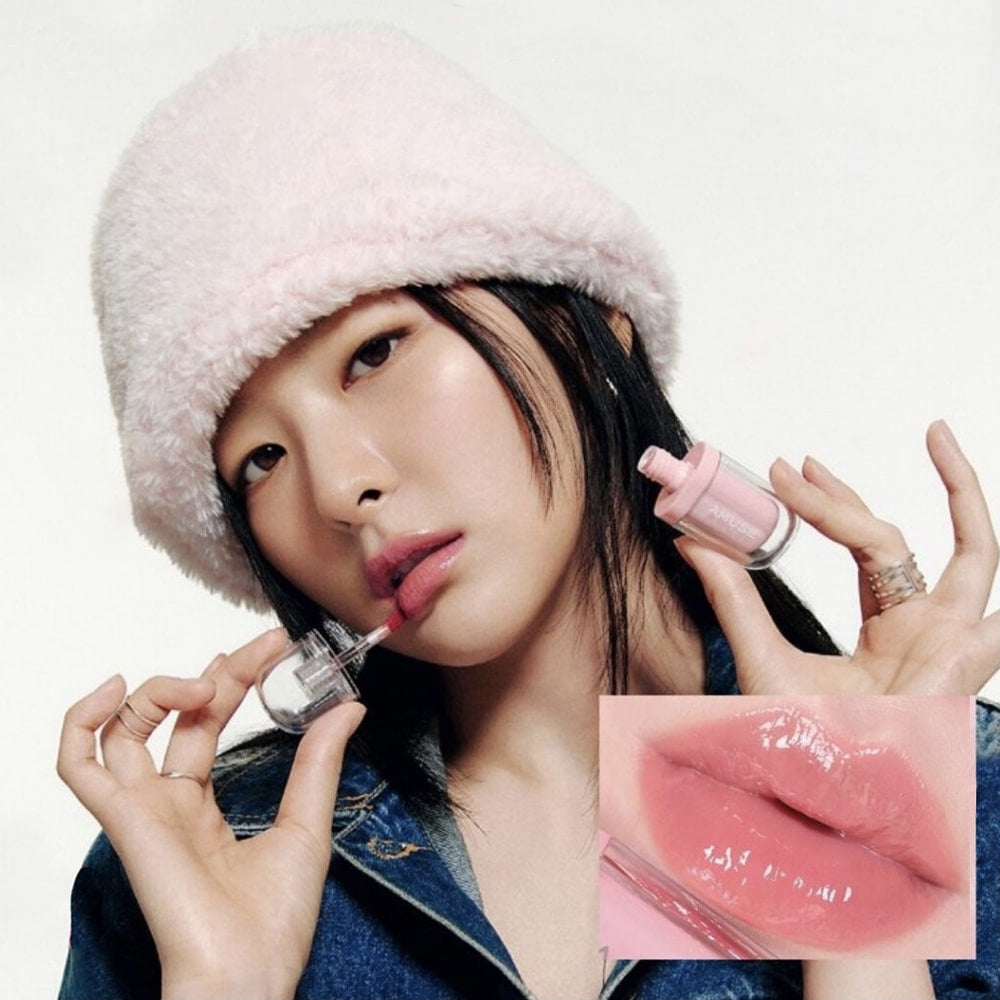 Peach shade gel lip tint with glossy finish and long-lasting wear.